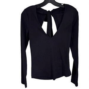 NEW Free People- Black V Neck Long Sleeve, open back  With Bow size medium.